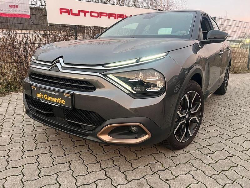 Grau Gebraucht 2023 Citroën e-C4 Limousine | 16.500 € (Superpreis) - Bild 1/4