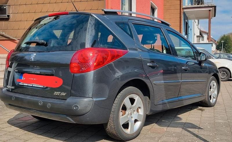 Gebraucht Peugeot 207 Premium 111 PS (81 kW) 2012 Grau Kombi