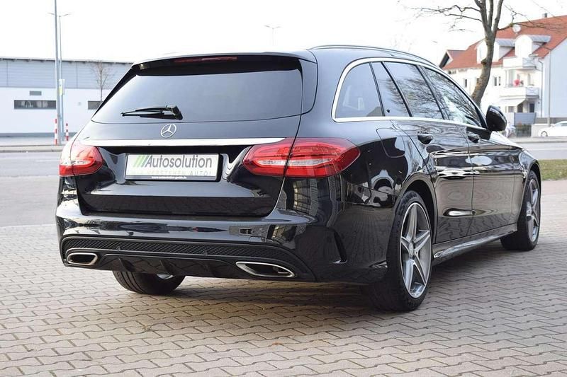 Gebraucht Mercedes C200 AMG line 184 PS (135 kW) 2016 Obsidianschwarz  metalliclack Kombi