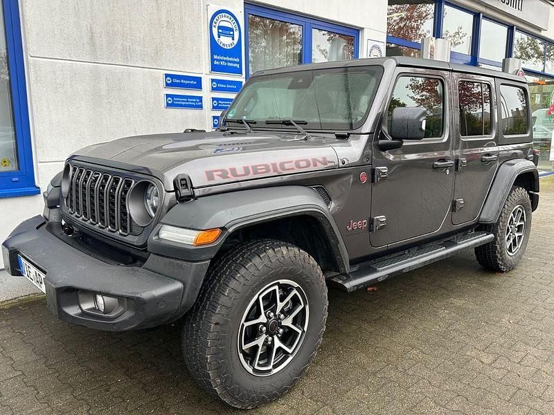 Grau Gebraucht 2024 Jeep Wrangler Rubicon SUV | 62.590 € (Teuer) - Bild 1/4