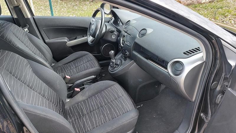 Gebraucht Mazda 2 75 PS (55 kW) 2009 Schwarz Kleinwagen