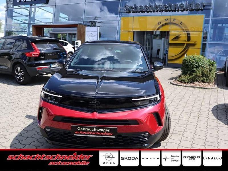 Gebraucht Opel Mokka-e 100 kW (136 PS) 2023 Kosmos rot metallic SUV