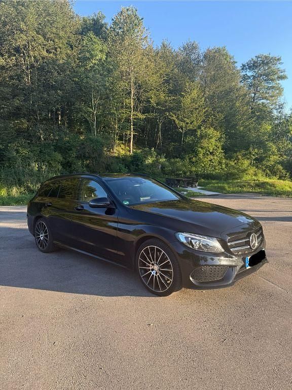 Schwarz Gebraucht 2016 Mercedes C250 AMG line Limousine | 19.500 € (Fairer Preis) - Bild 1/4