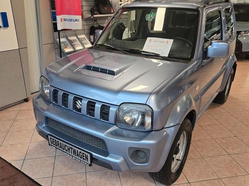 Blau Gebraucht 2013 Suzuki Jimny Club SUV | 10.980 € (Fairer Preis) - Bild 1/4