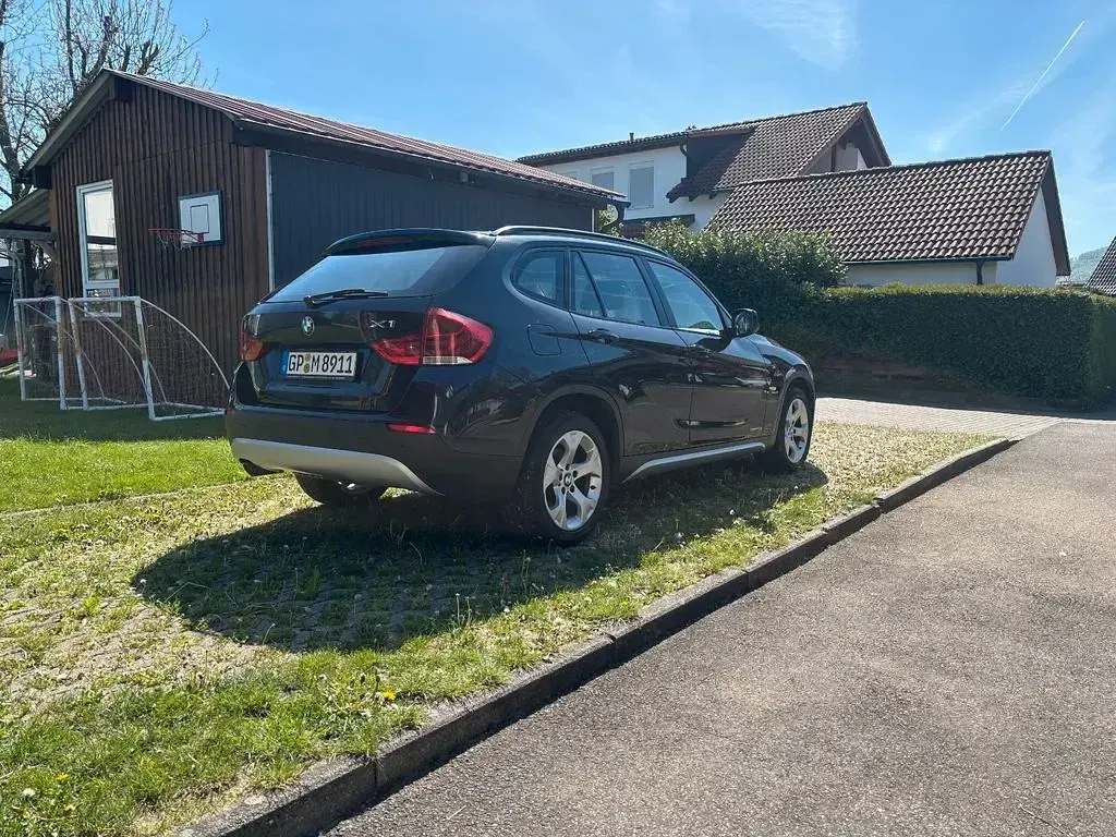 Używany BMW X1 xLine 177 KM (130 kW) 2011 Czarny SUV
