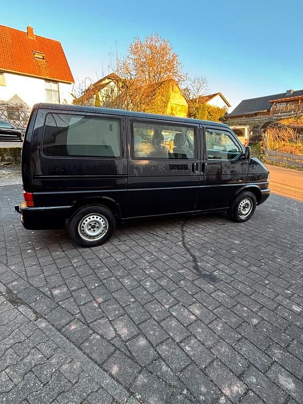 Second-hand VW Caravelle 102 CP (75 kW) 2002 Negru Van