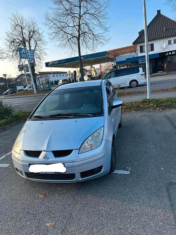 Grau Gebraucht 2004 Mitsubishi Colt Kleinwagen | 1.299 € (Fairer Preis) - Bild 1/4