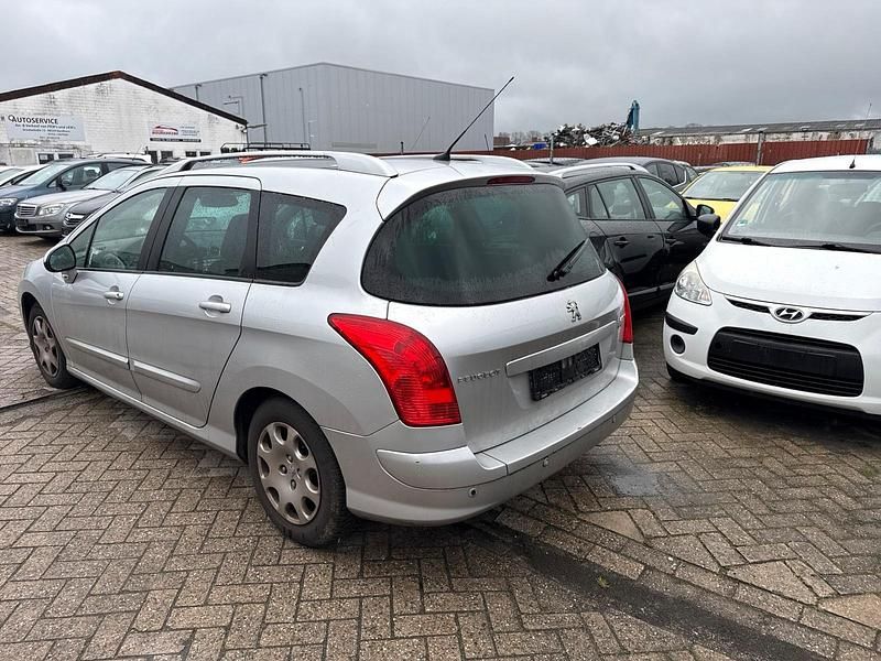 Gebraucht Peugeot 308 112 PS (82 kW) 2012 Schwarz Kombi