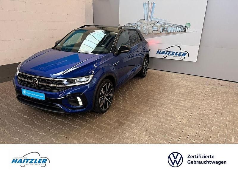 Lapiz blue metallic (metallic) Gebraucht 2023 VW T-Roc R-line Plus SUV | 30.780 € (Fairer Preis) - Bild 1/4