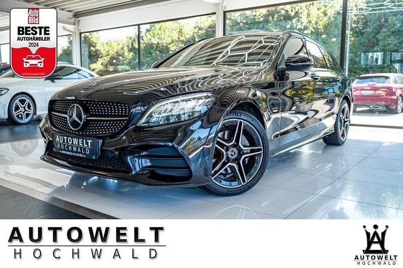 Schwarz Gebraucht 2018 Mercedes C220 AMG line Limousine | 25.980 € (Teuer) - Bild 1/4