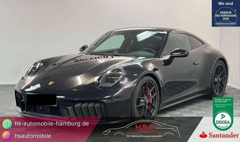 Tiefschwarz Gebraucht 2024 Porsche 911 Carrera 4 GTS Coupé | 184.000 € - Bild 1/4