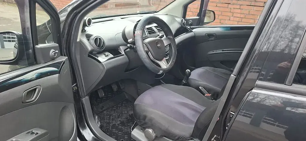 Gebraucht Chevrolet Spark 94 PS (69 kW) 2011 Schwarz Kleinwagen