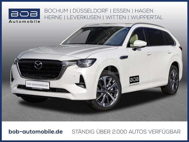 Rhodium white Gebraucht 2024 Mazda CX-80 Takumi-Line SUV | 51.666 € (Fairer Preis) - Bild 1/3