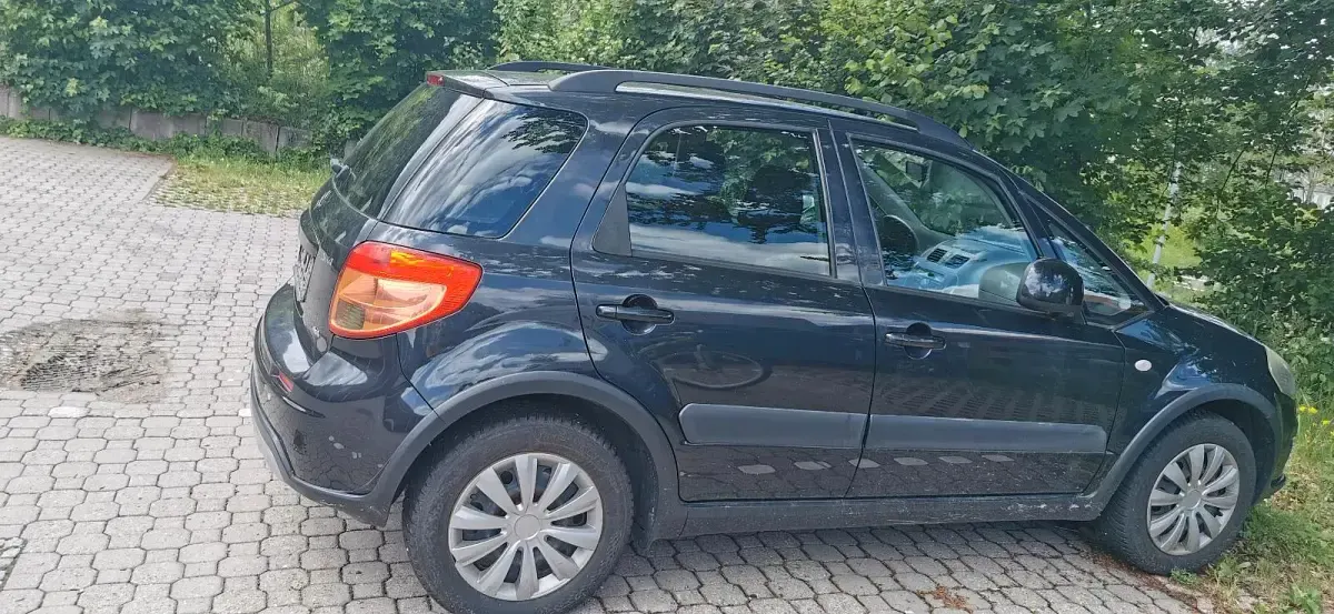 Gebraucht Suzuki Vitara 107 PS (78 kW) 2010 Schwarz Kleinwagen