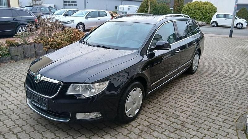 Używany Skoda Superb Elegance 140 KM (102 kW) 2013 Czarny Kombi
