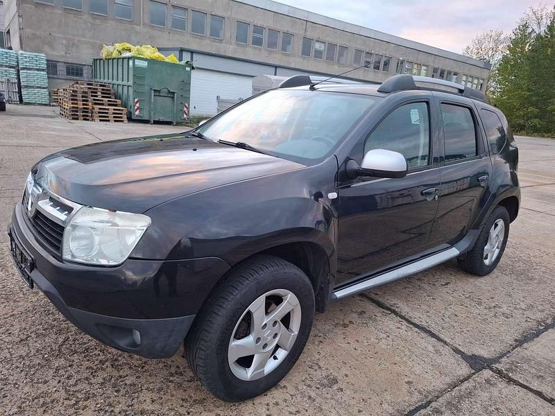 Perlmuttschwarz Gebraucht 2010 Dacia Duster Lauréate SUV | 4.399 € (Fairer Preis) - Bild 1/4