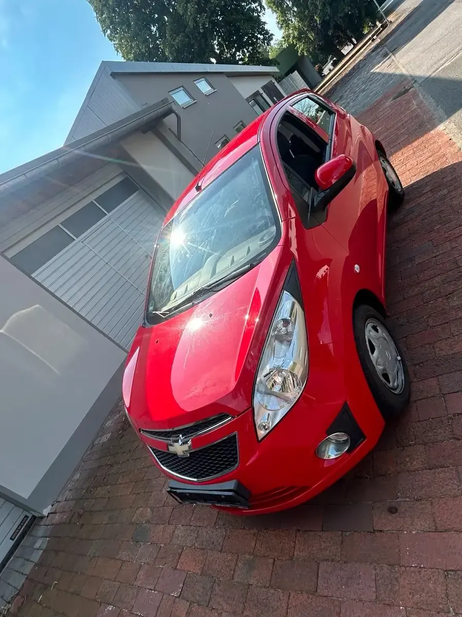 Gebraucht Chevrolet Spark 68 PS (50 kW) 2013 Rot Kleinwagen