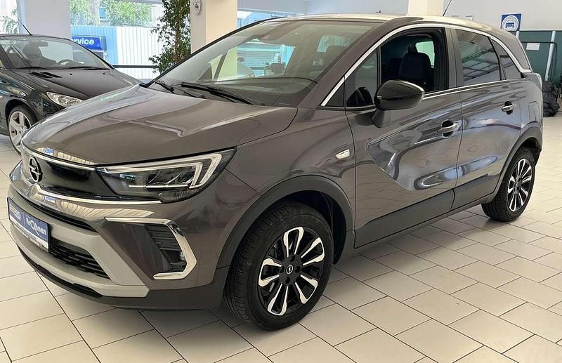 Mondstein grau/e:vulkan grau Gebraucht 2023 Opel Crossland X Elegance SUV | 17.990 € (Guter Preis) - Bild 1/4
