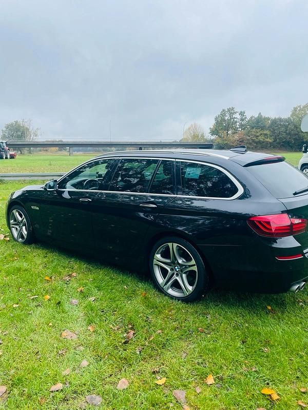 Gebraucht BMW 520 184 PS (135 kW) 2014 Schwarz Kombi
