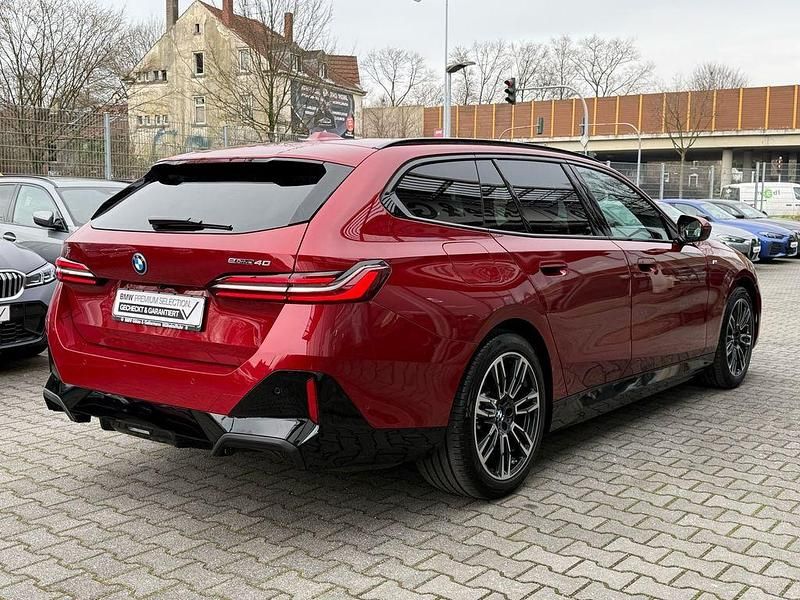 Gebraucht BMW i5 M Sport 250 kW (340 PS) 2025 Fire red Kombi