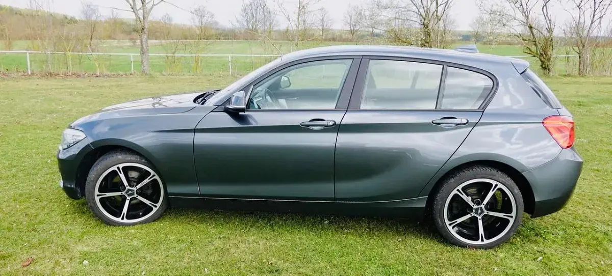 Używany BMW 118 150 KM (110 kW) 2019 Szary Hatchback