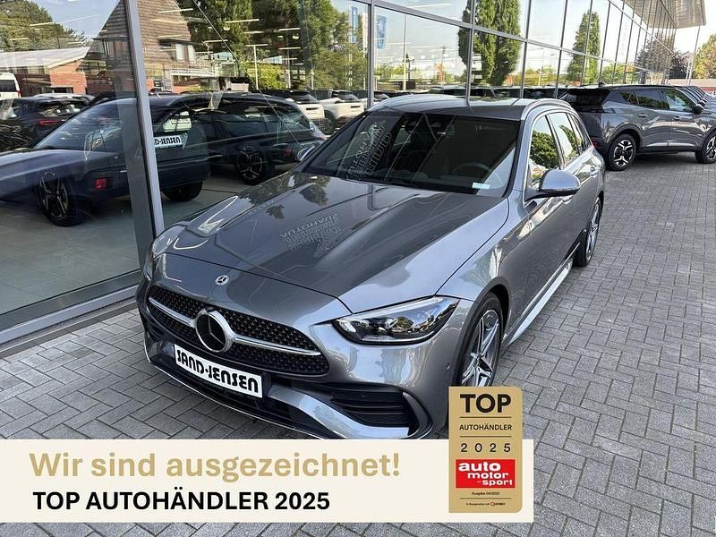 Selenitgrau metallic Gebraucht 2024 Mercedes C220 AMG Line Premium Kombi | 46.995 € - Bild 1/4