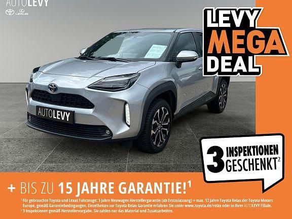 Shimmering silver metallic Gebraucht 2022 Toyota Yaris Hybrid Connect Style SUV | 21.888 € (Superpreis) - Bild 1/4