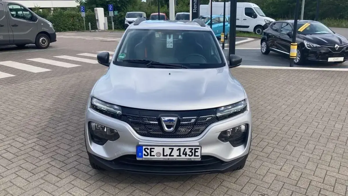 Gebraucht Dacia Spring Comfort 33 kW (45 PS) 2021 Silbergrau metallic Kleinwagen