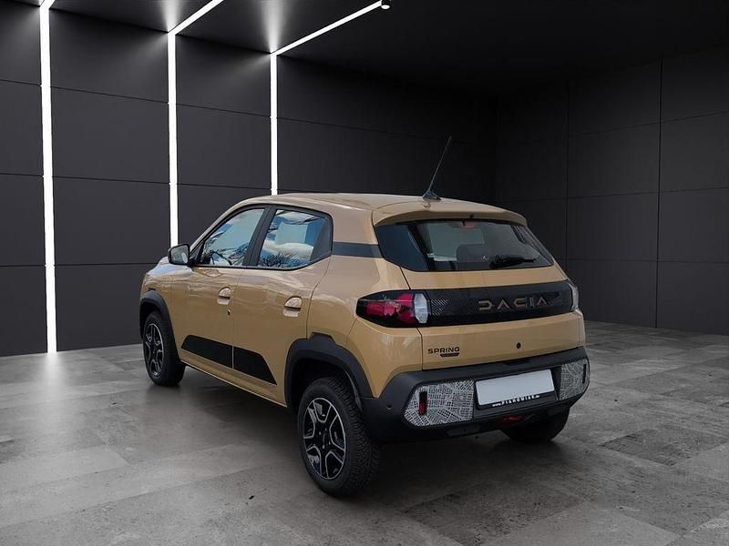 Gebraucht Dacia Spring Extreme 47 kW (65 PS) 2024 Safaribeige Kleinwagen