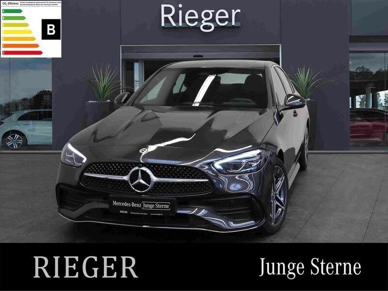 Grey metallic Gebraucht 2024 Mercedes C300e AMG Limousine | 43.899 € - Bild 1/4