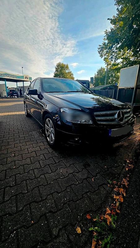 Schwarz Gebraucht 2009 Mercedes C200 Limousine | 7.350 € - Bild 1/4