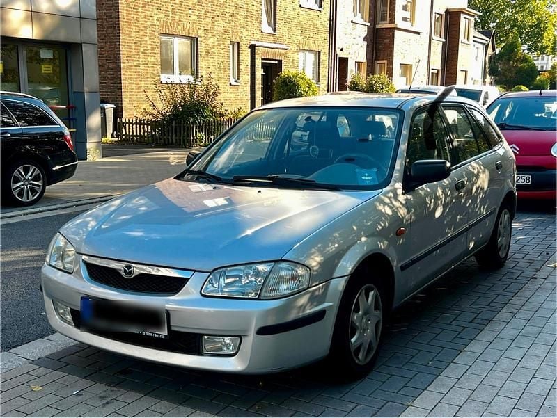 Silber Gebraucht 1999 Mazda 323F Limousine | 1.550 € (Fairer Preis) - Bild 1/4