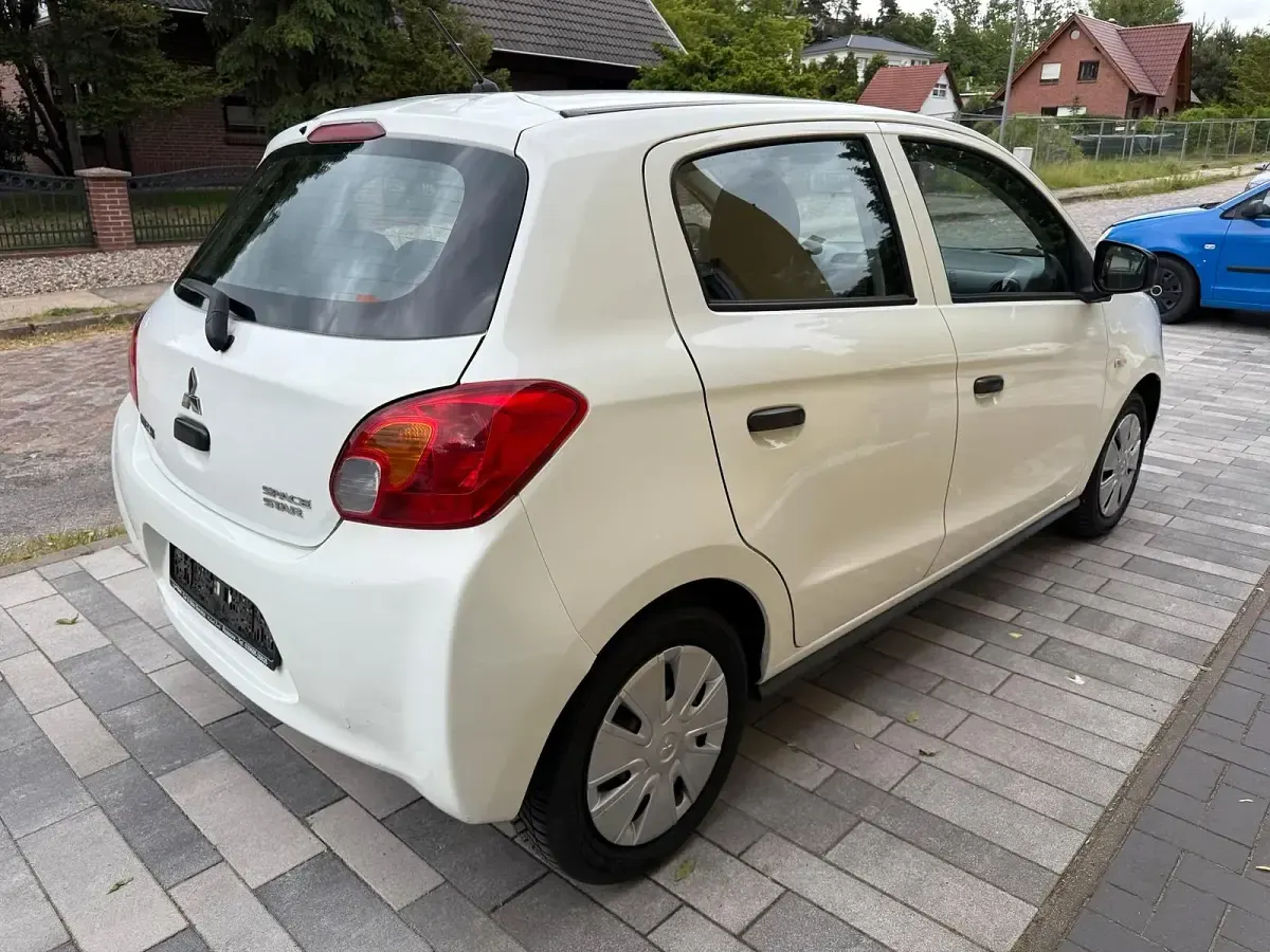 Gebraucht Mitsubishi Space Star 71 PS (52 kW) 2015 Weiß Kleinwagen