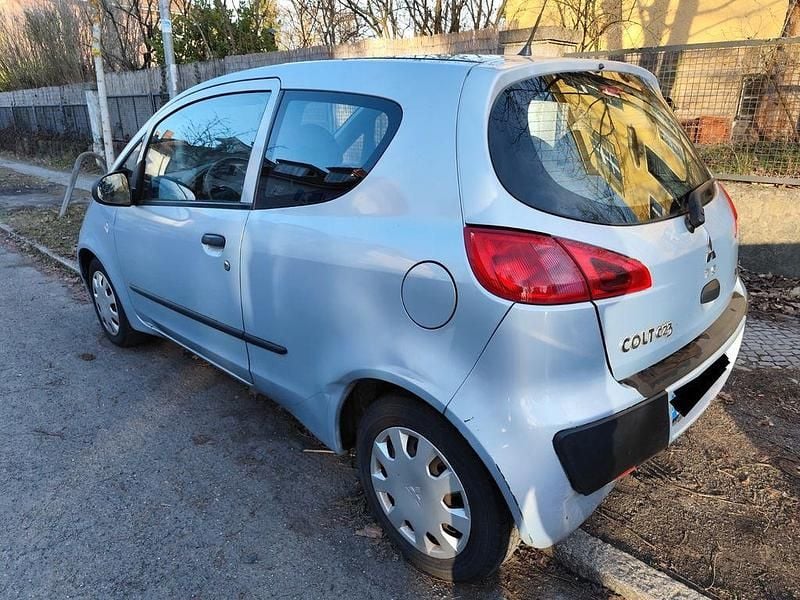 Second-hand Mitsubishi Colt Inform 75 CP (55 kW) 2006 Argintiu Berlinǎ
