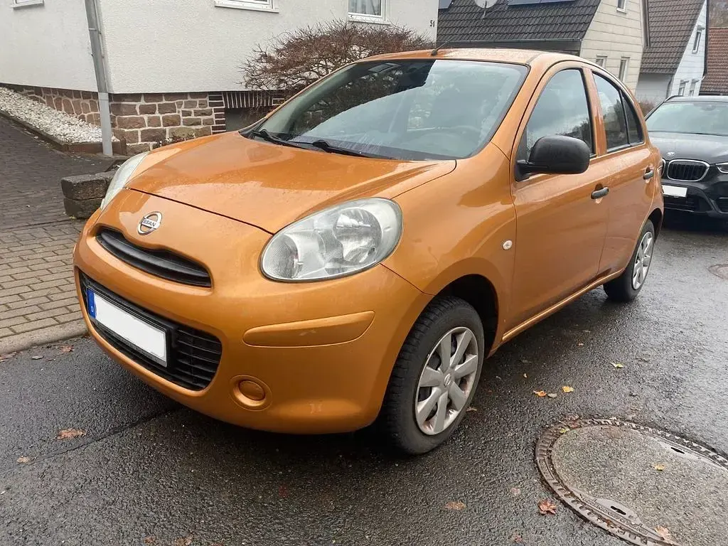 Gebraucht Nissan Micra 80 PS (58 kW) 2012 Orange Kleinwagen