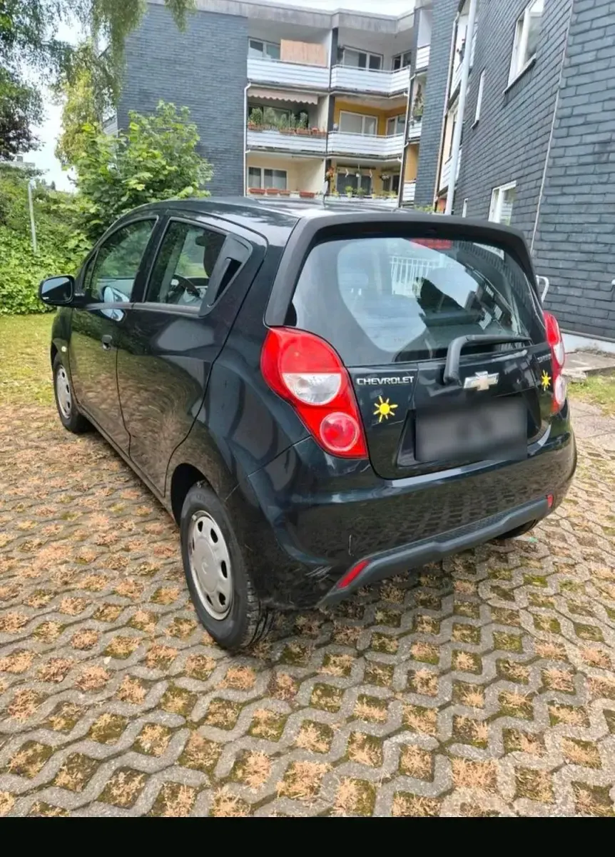 Gebraucht Chevrolet Spark 68 PS (50 kW) 2013 Schwarz Kleinwagen