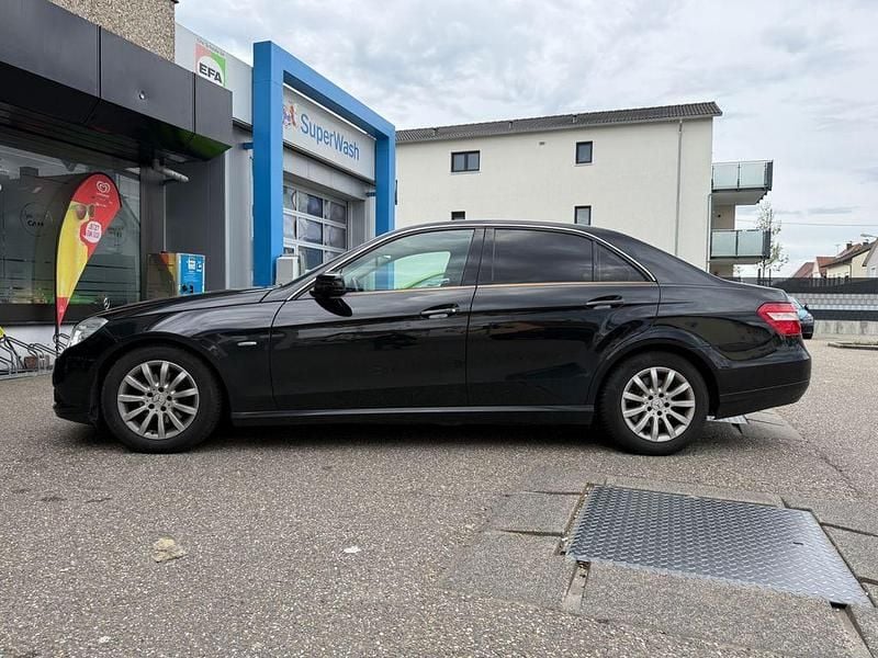 Second-hand Mercedes E220 170 CP (125 kW) 2009 Negru Berlinǎ