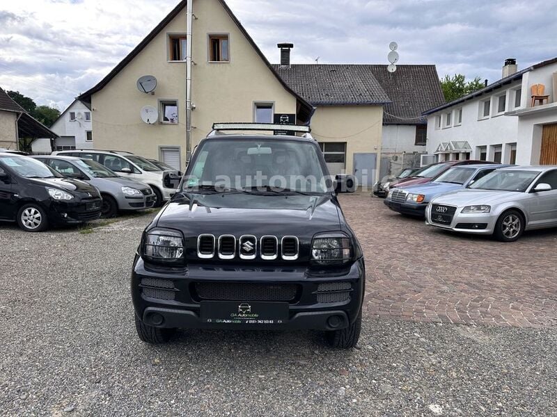 Schwarz Gebraucht 2009 Suzuki Jimny SUV | 9.590 € (Fairer Preis) - Bild 1/4
