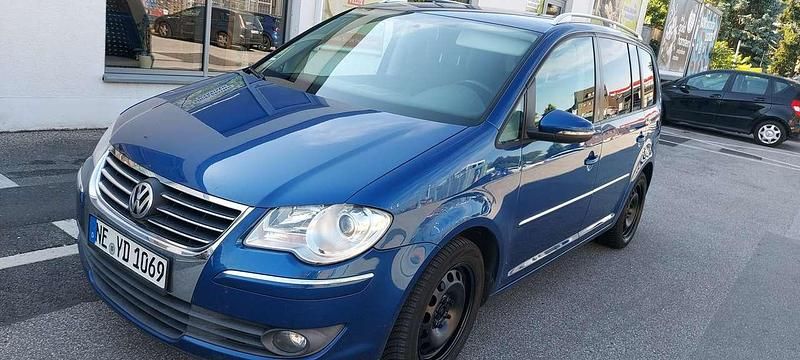 Blau Gebraucht 2009 VW Touran Highline Van / Kleinbus | 2.400 € (Superpreis) - Bild 1/4