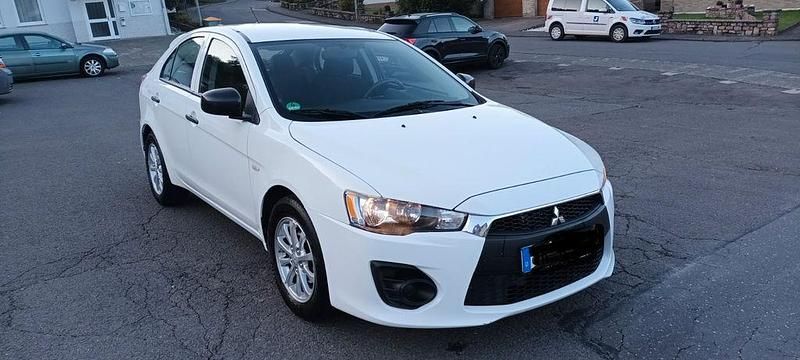 Weiß Gebraucht 2017 Mitsubishi Lancer Limousine | 5.599 € (Guter Preis) - Bild 1/4