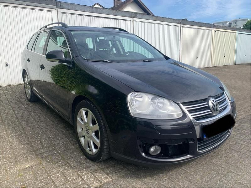 Second-hand VW Golf V 140 CP (102 kW) 2008 Negru Break