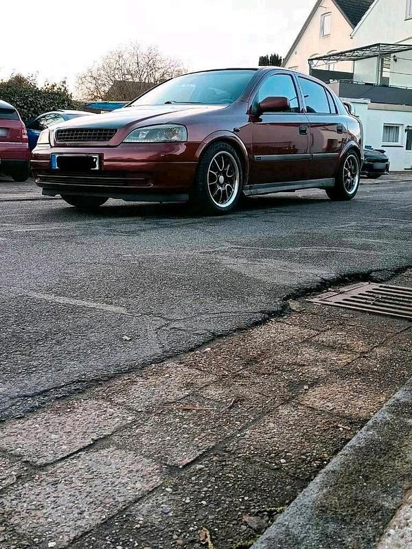 Second-hand Opel Astra 101 CP (74 kW) 2000 Roșu Hatchback