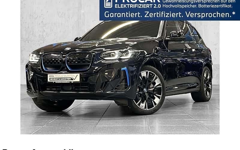 M carbonschwarz Gebraucht 2023 BMW iX3 M Sport SUV | 46.490 € (Fairer Preis) - Bild 1/4