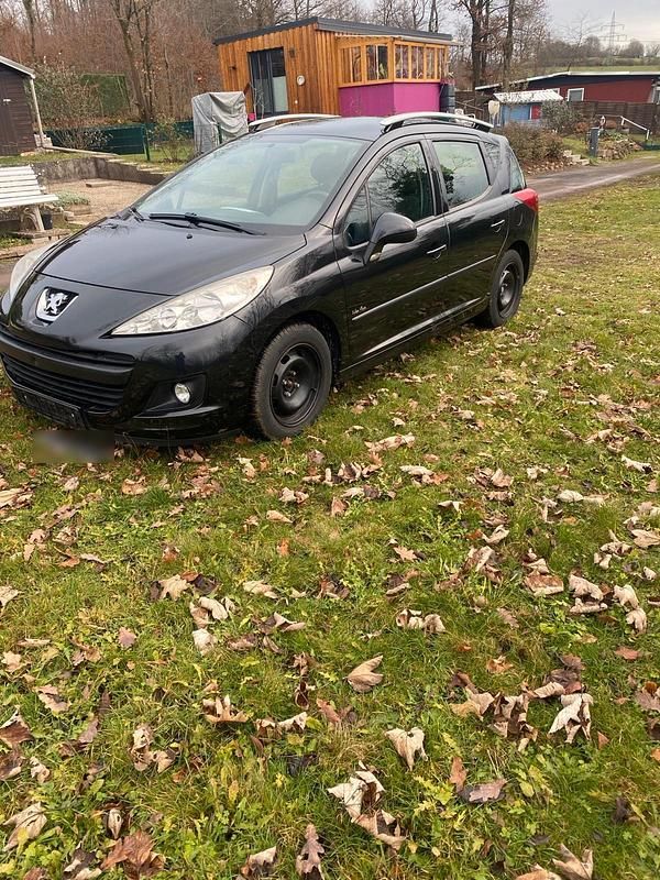 Gebraucht Peugeot 207 95 PS (69 kW) 2011 Schwarz Kombi