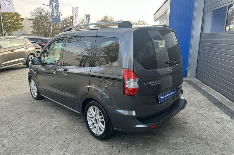 Gebraucht Ford Tourneo Courier 101 PS (74 kW) 2015 Grau (magneticgrau) Van / Kleinbus
