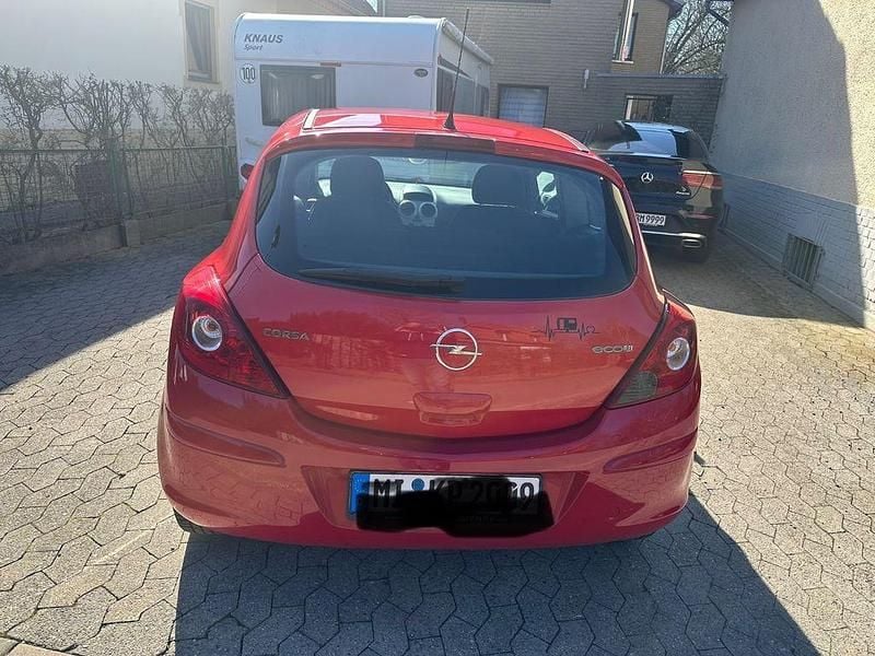 Gebraucht Opel Corsa Edition 60 PS (44 kW) 2009 Rot Kleinwagen