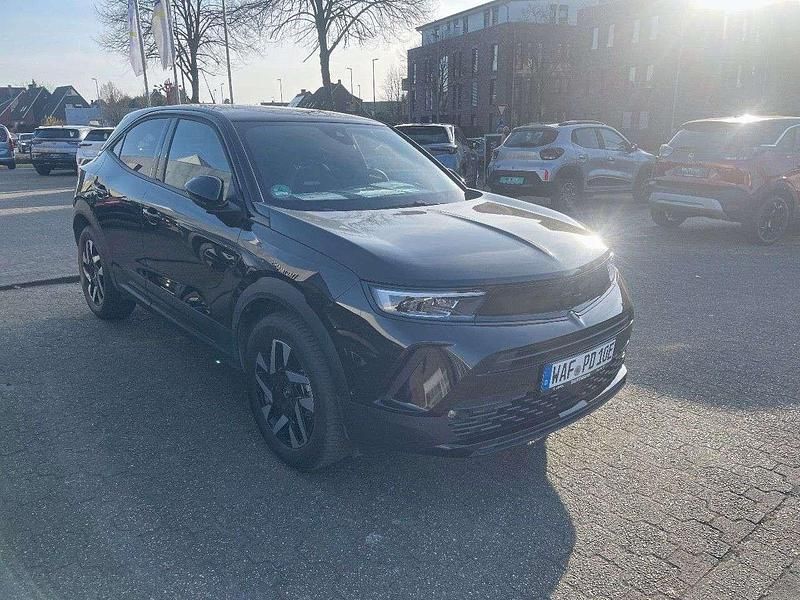 Gebraucht Opel Mokka-e drive 100 kW (136 PS) 2024 Karbon schwarz SUV