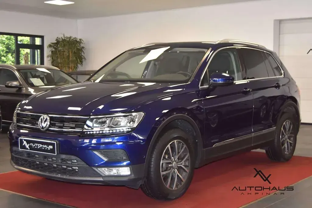 Gebraucht VW Tiguan Comfortline 179 PS (131 kW) 2016 Atlantic blue metallic SUV
