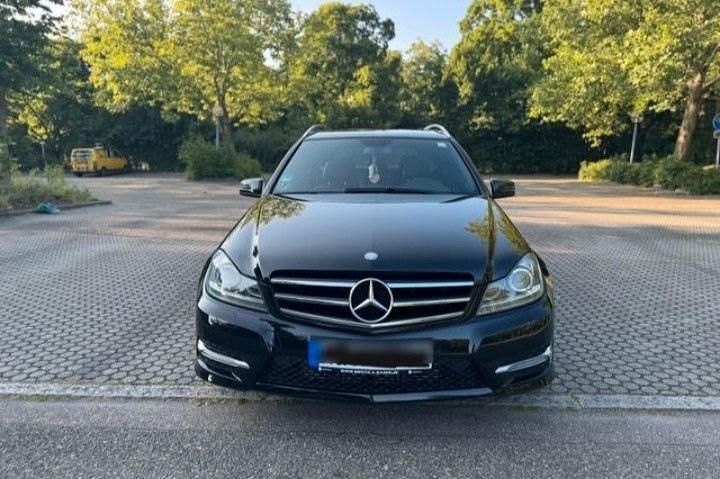 Schwarz Gebraucht 2014 Mercedes C160 Coupé | 9.950 € - Bild 1/4