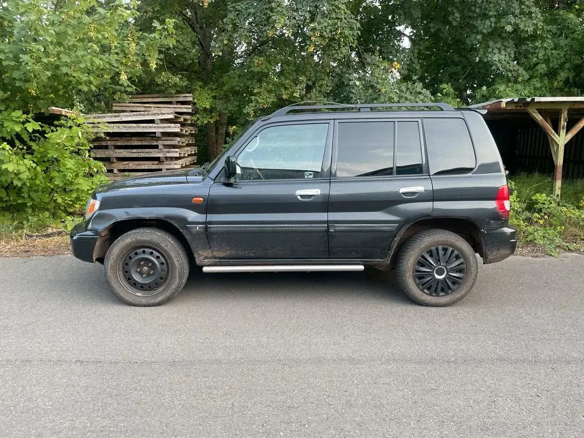 Gebraucht Mitsubishi Pajero Motion 129 PS (94 kW) 2004 Schwarz SUV